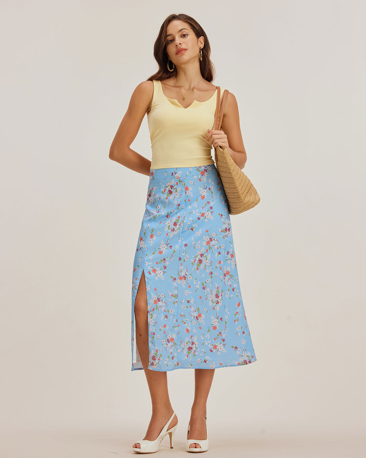 Saia midi evasê floral azul com fenda