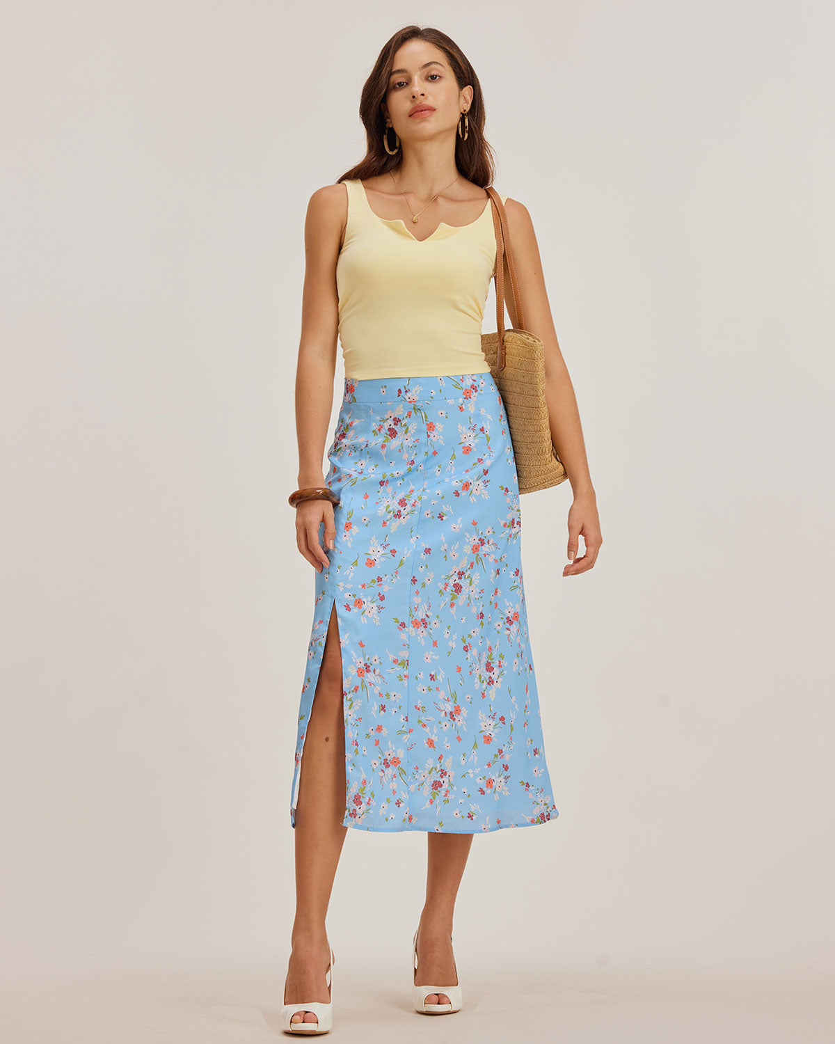 Saia midi evasê floral azul com fenda