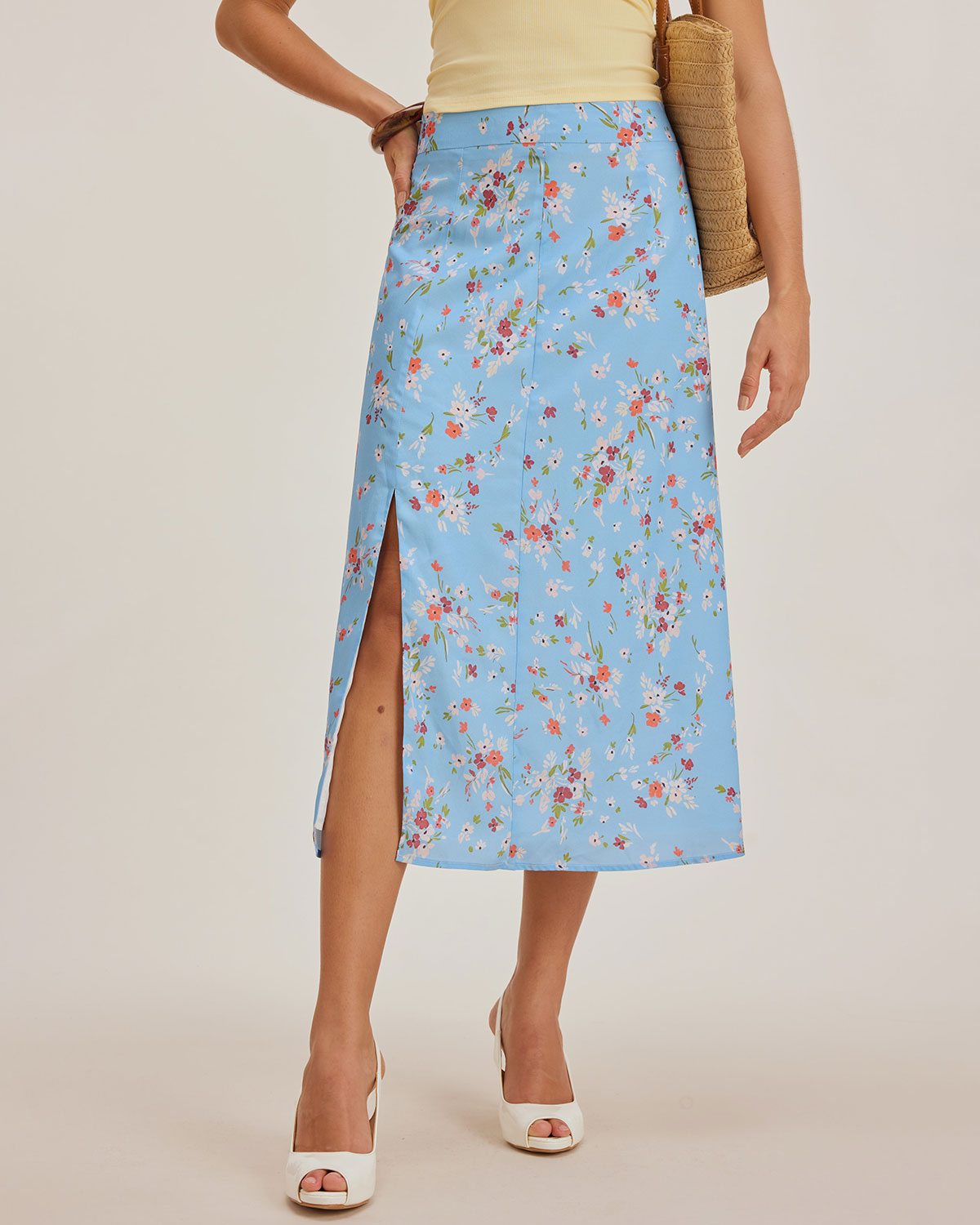 Saia midi evasê floral azul com fenda