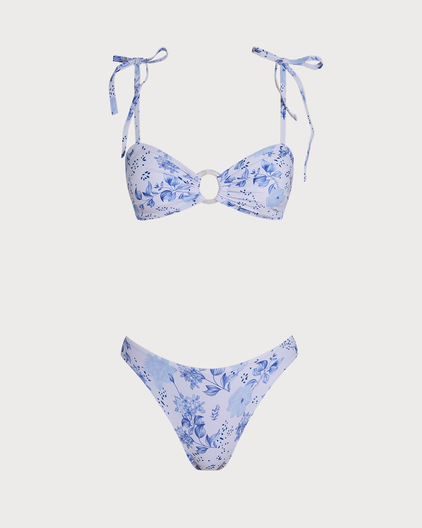 Biquíni triângulo branco com estampa floral e tiras para amarrar