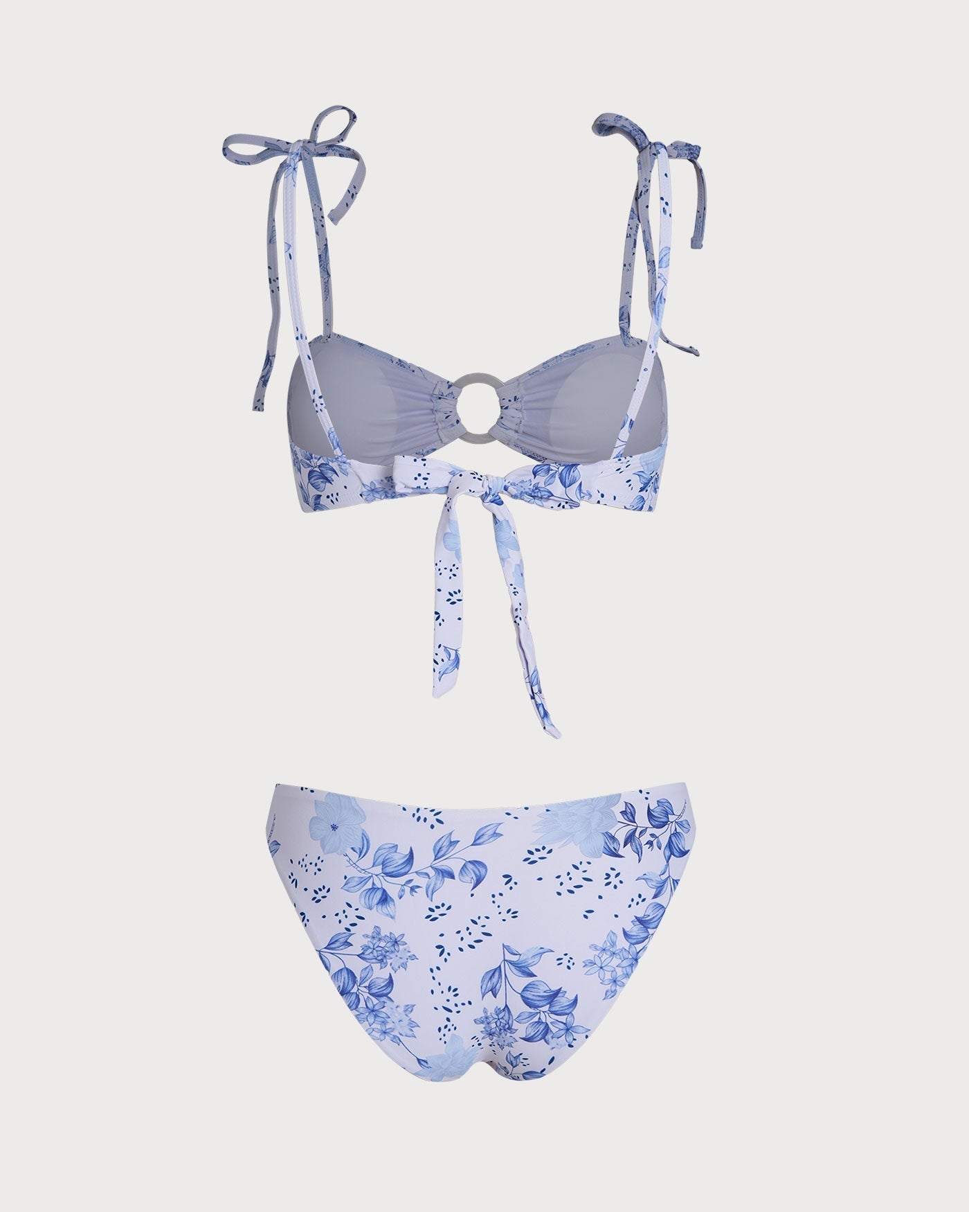 Biquíni triângulo branco com estampa floral e tiras para amarrar