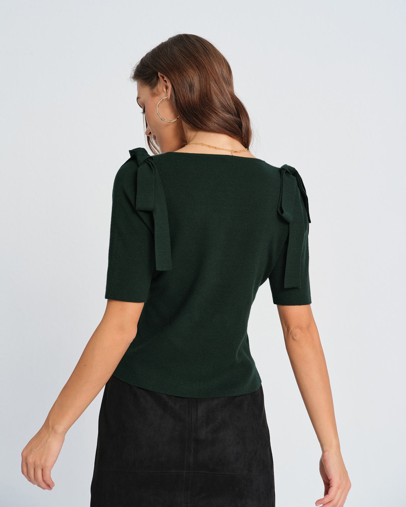 Cardigan de tricô verde com decote quadrado e laço