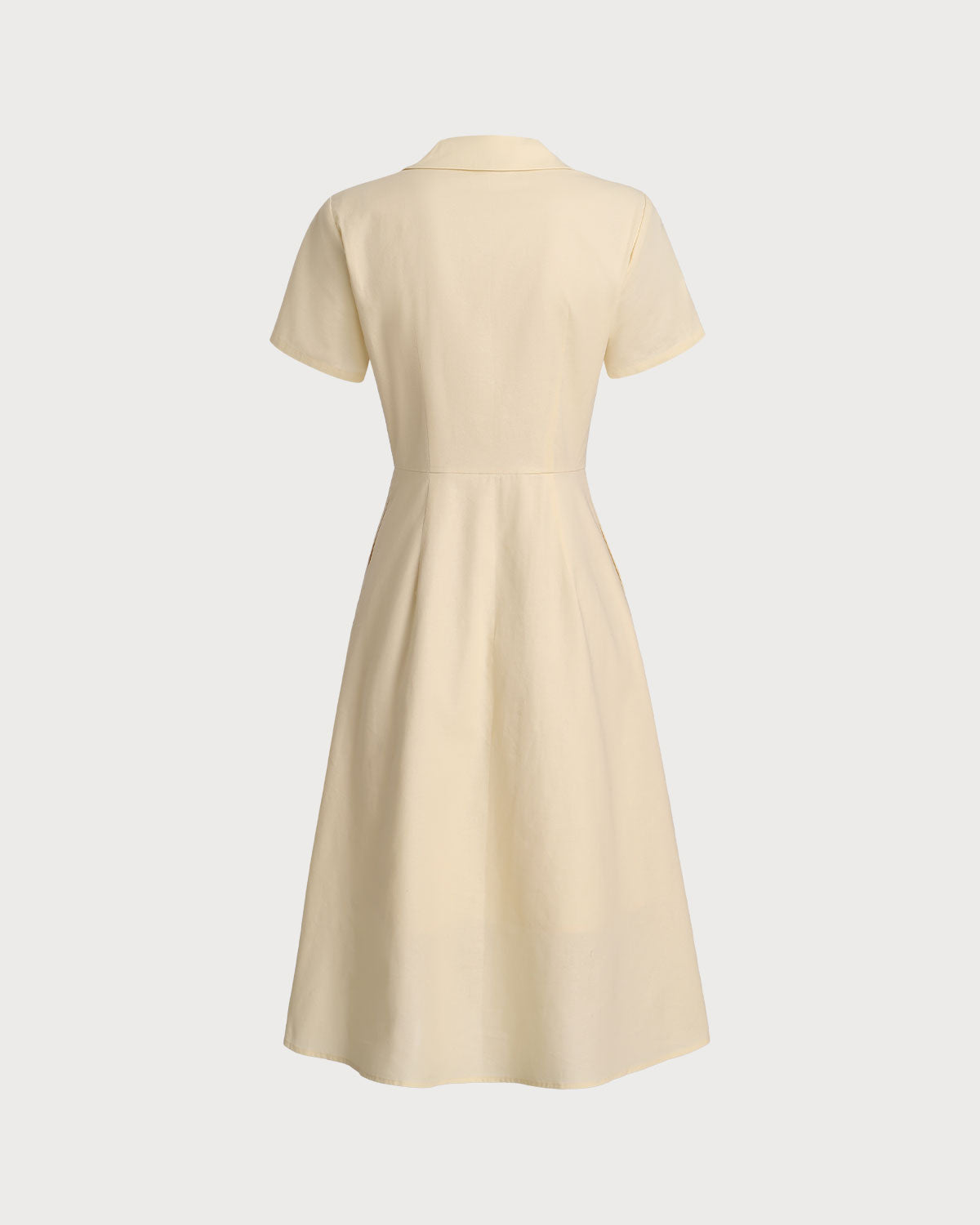 Vestido midi amarelo com botões e mangas curtas
