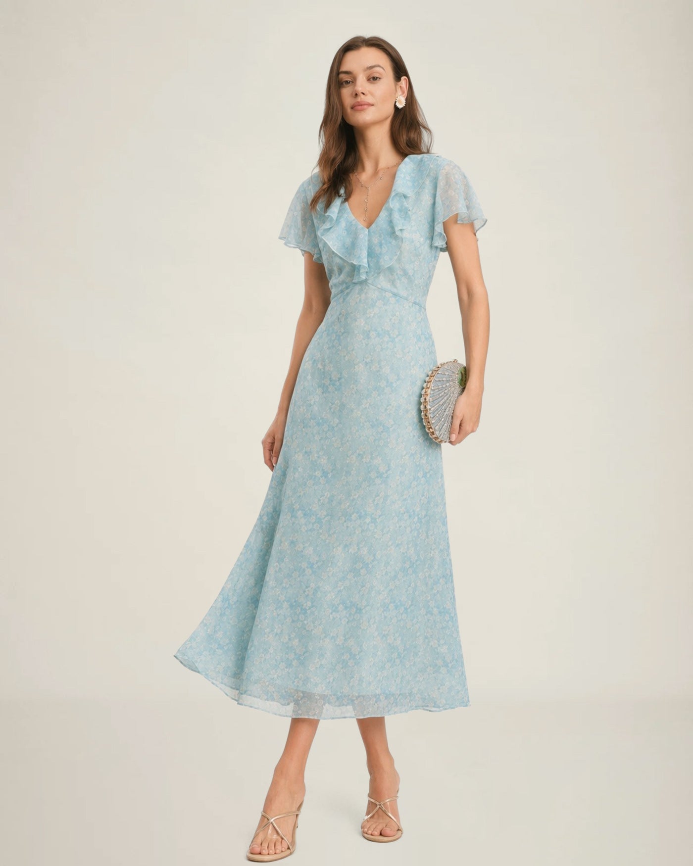 Vestido midi azul com decote em V, estampa floral e babados