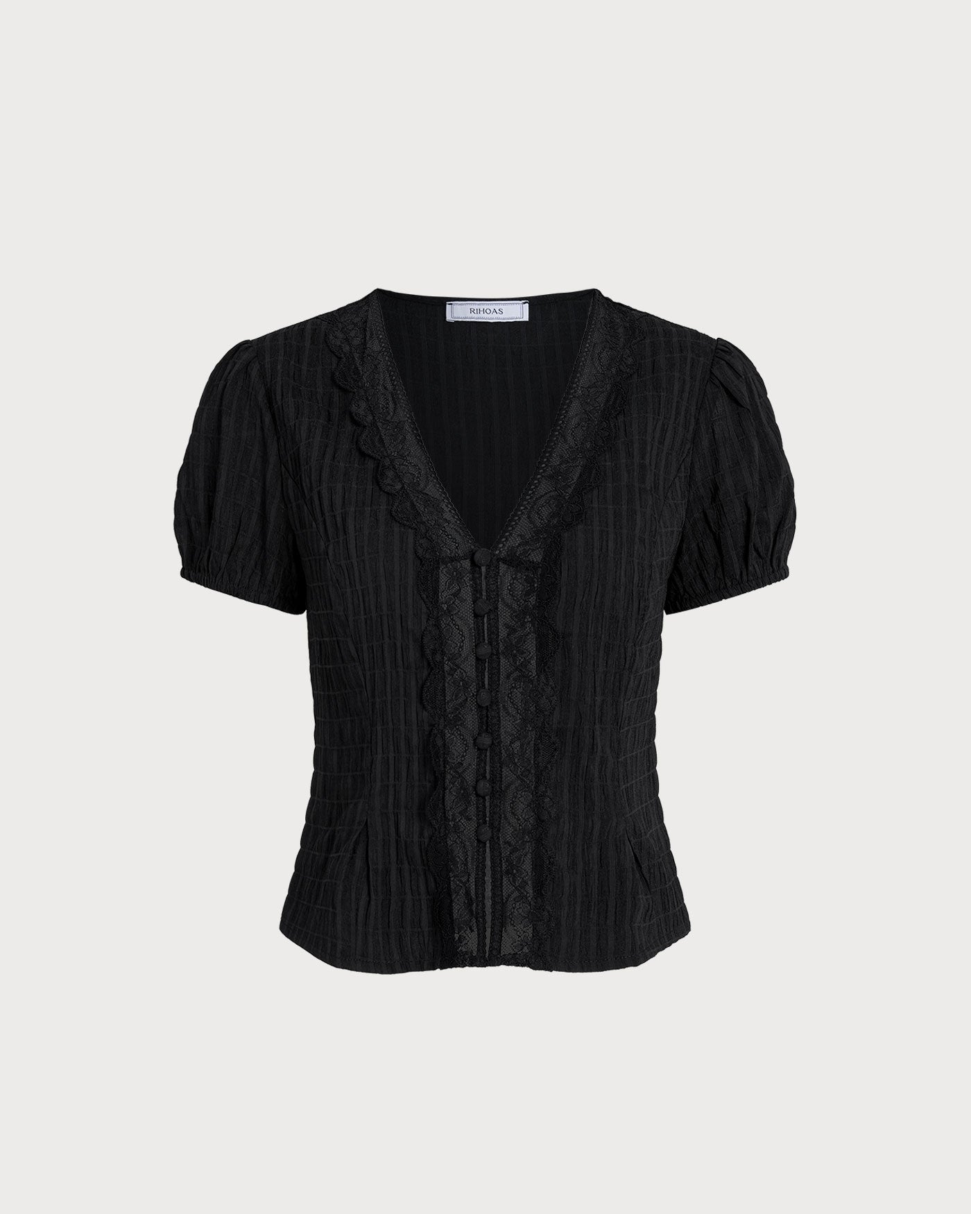 Blusa preta com renda jacquard e botões