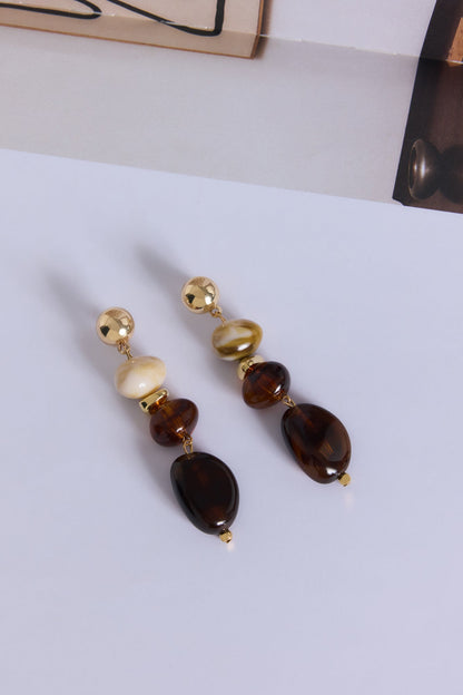 Brincos marcantes com miçangas — Dourado