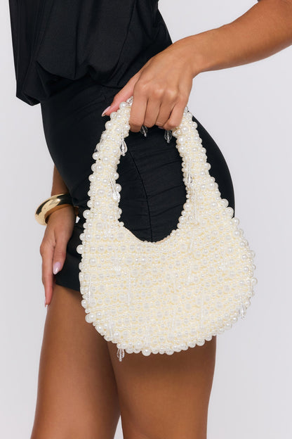 Bolsa com brilho perolado — Pérola