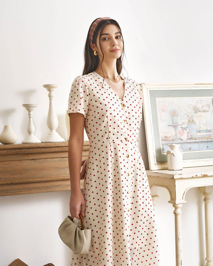 Vestido midi bege com decote em V, estampa poá e botões frontais