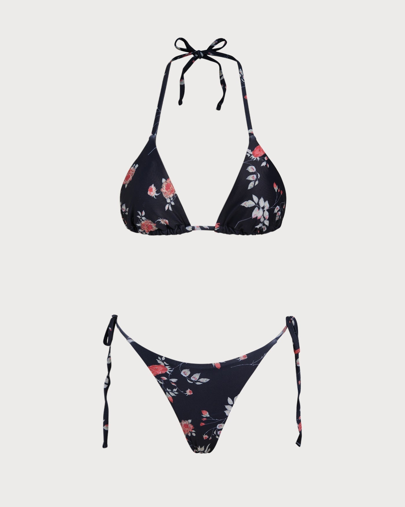 Conjunto de biquíni cortininha preto com estampa floral
