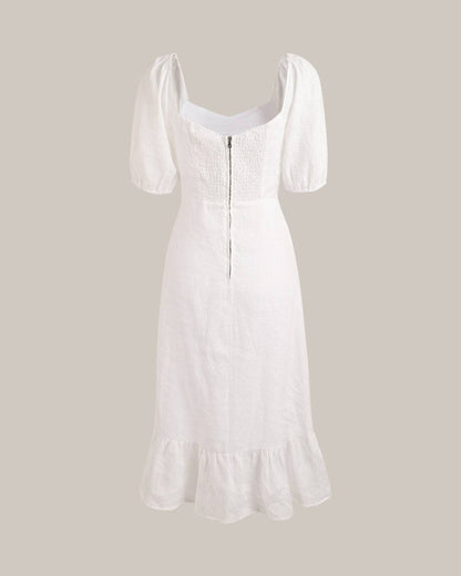 Vestido midi com mangas bufantes e fenda na barra