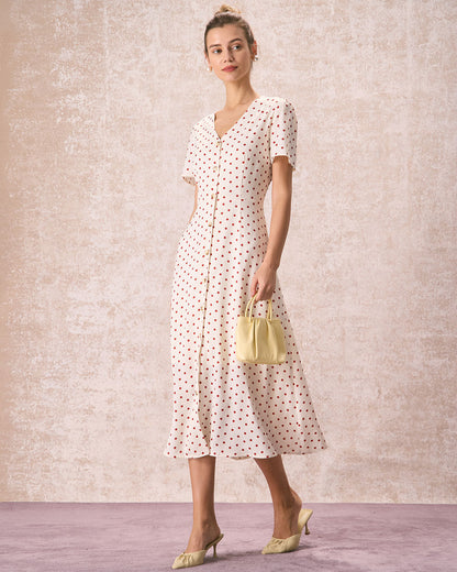 Vestido midi bege com decote em V, estampa poá e botões frontais