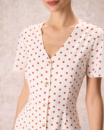 Vestido midi bege com decote em V, estampa poá e botões frontais