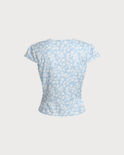 Blusa floral azul com decote em V