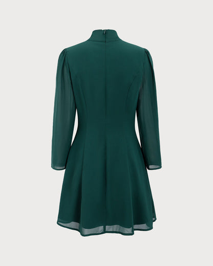 Vestido mini verde semitransparente com laço no pescoço