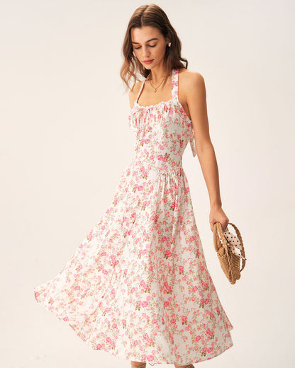 Vestido midi rosa com estampa floral e decote halter