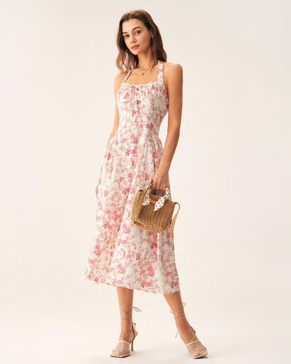 Vestido midi rosa com estampa floral e decote halter