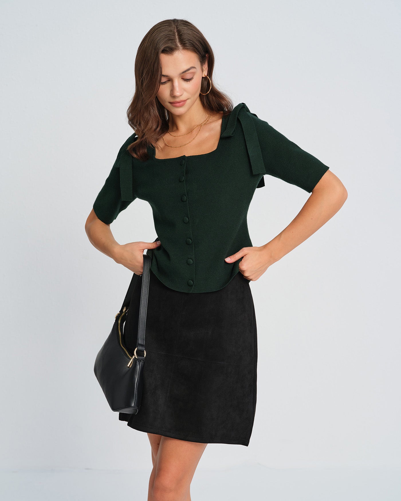 Cardigan de tricô verde com decote quadrado e laço