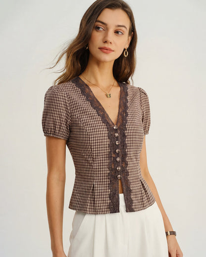 Blusa xadrez marrom com decote em V e mangas bufantes
