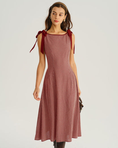 Vestido midi evasê em xadrez vichy vermelho com alças de amarrar