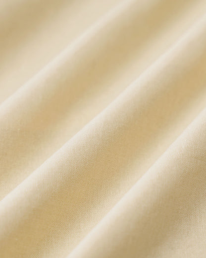 Vestido midi amarelo com botões e mangas curtas