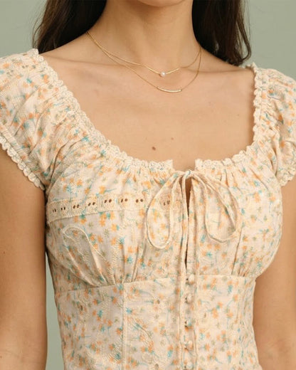 Blusa floral amarela com decote quadrado