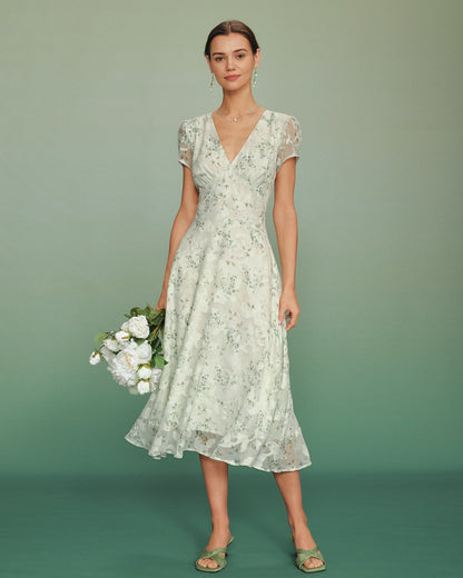 Vestido midi túnica floral verde com mangas bufantes