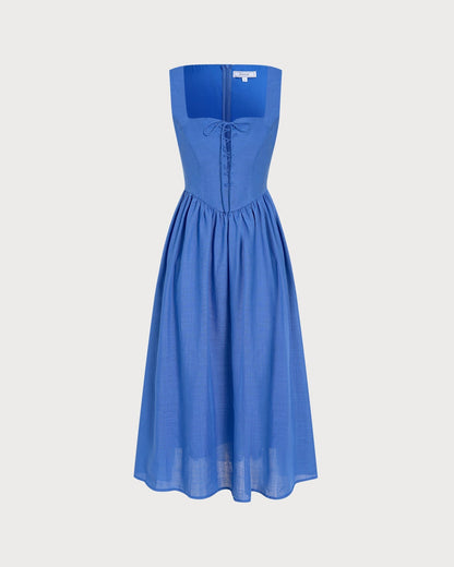Vestido midi azul com decote quadrado, detalhe em amarração e bolsos