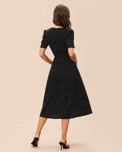 Vestido midi preto com decote em V e estampa de poá