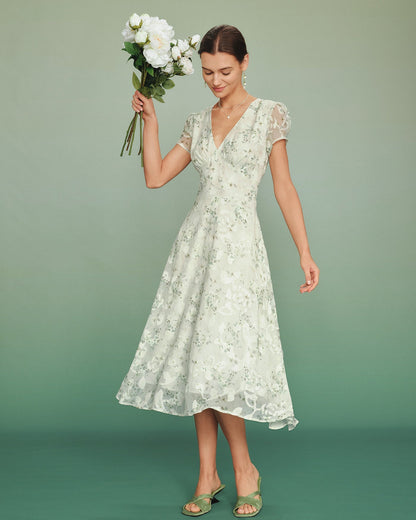 Vestido midi túnica floral verde com mangas bufantes