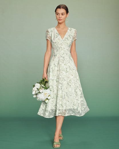 Vestido midi túnica floral verde com mangas bufantes
