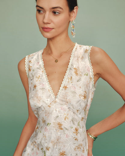 Vestido mini damasco com decote em V e recortes florais