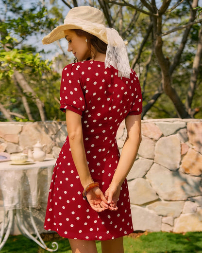 Vestido mini vermelho com estampa poá e mangas bufantes