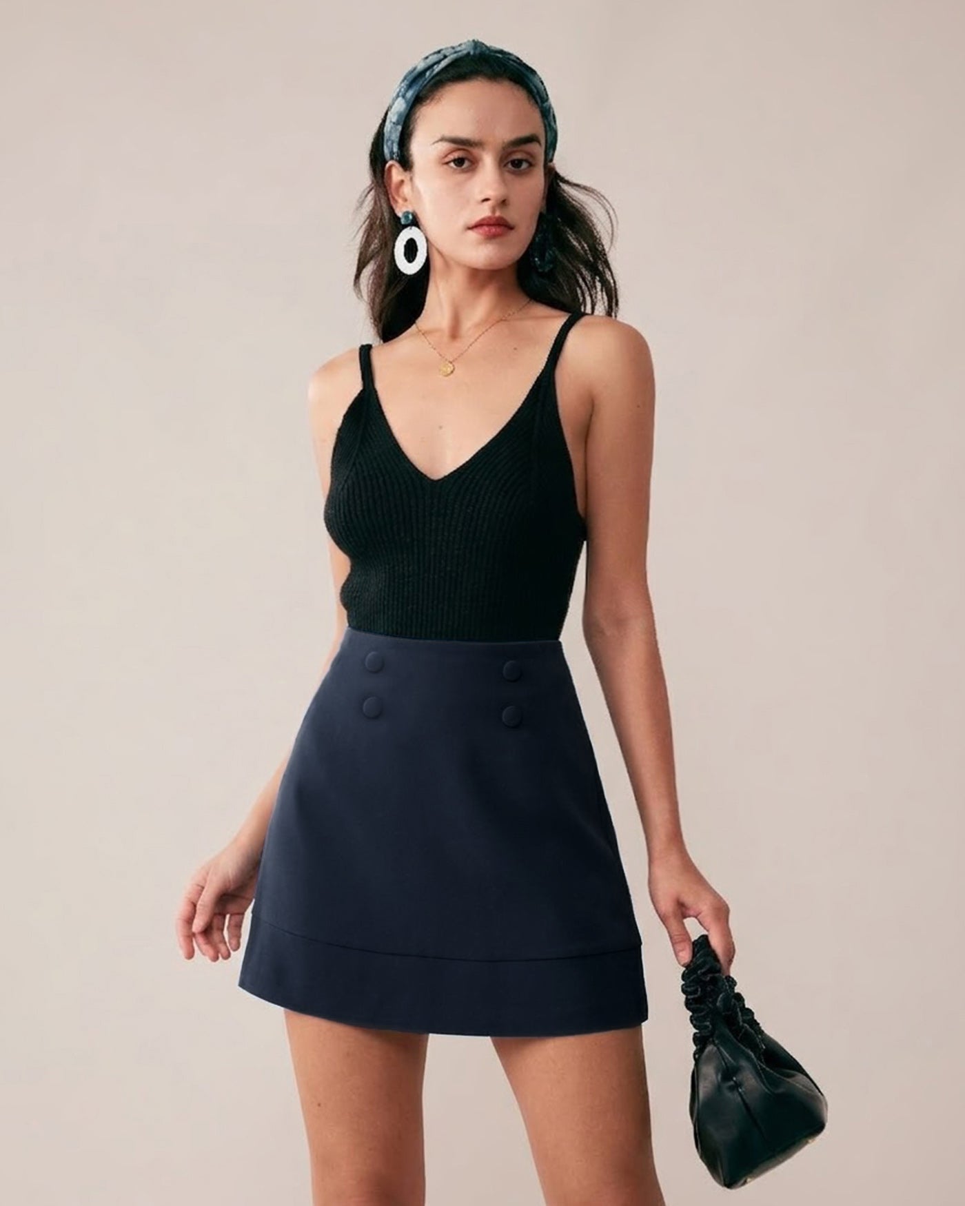 Minissaia com bolsos azul-marinho